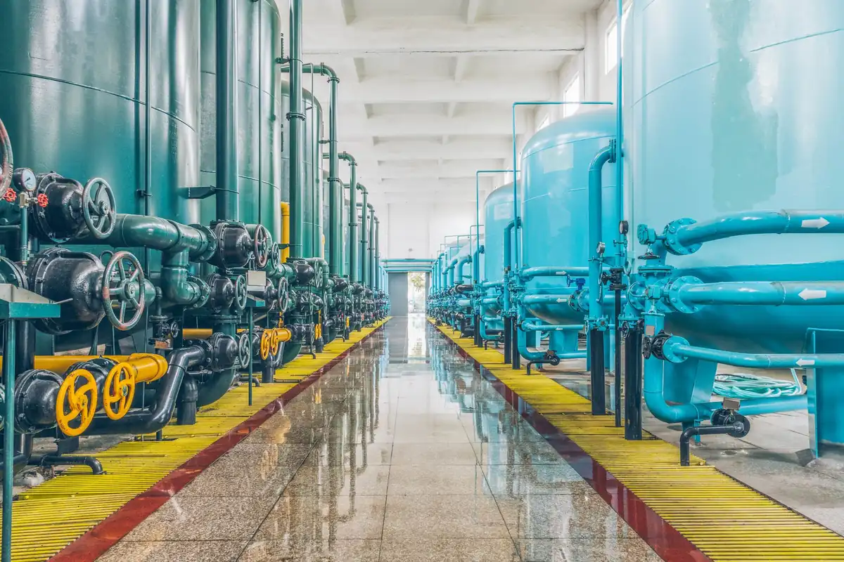 Rows of process vessels and piping inside a chemical plant